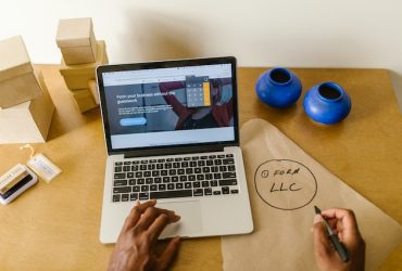 person using his laptop